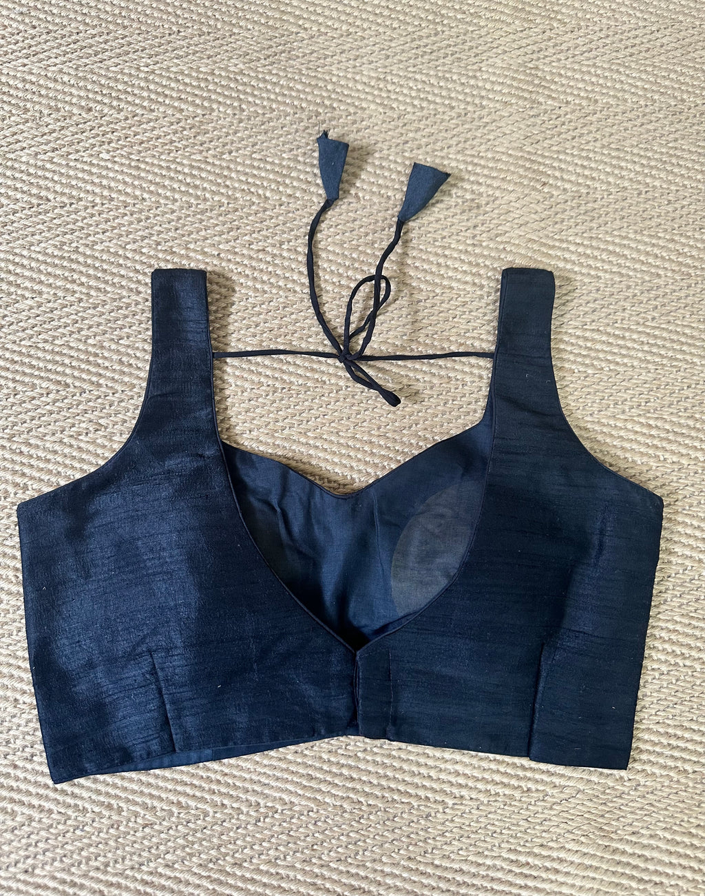 Black raw silk sleeveless blouse