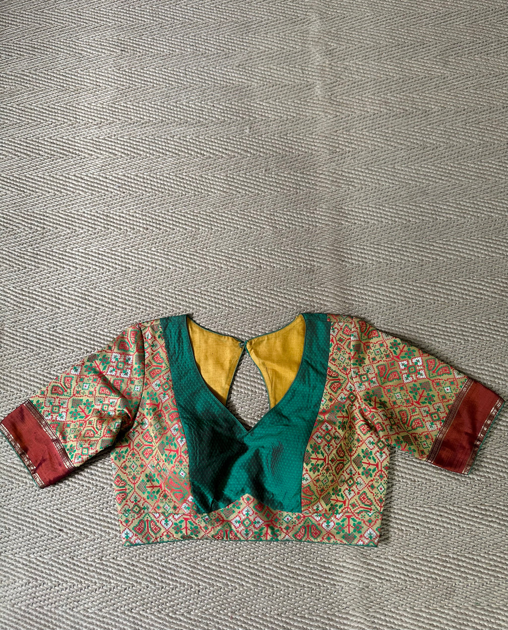 Green silk blouse