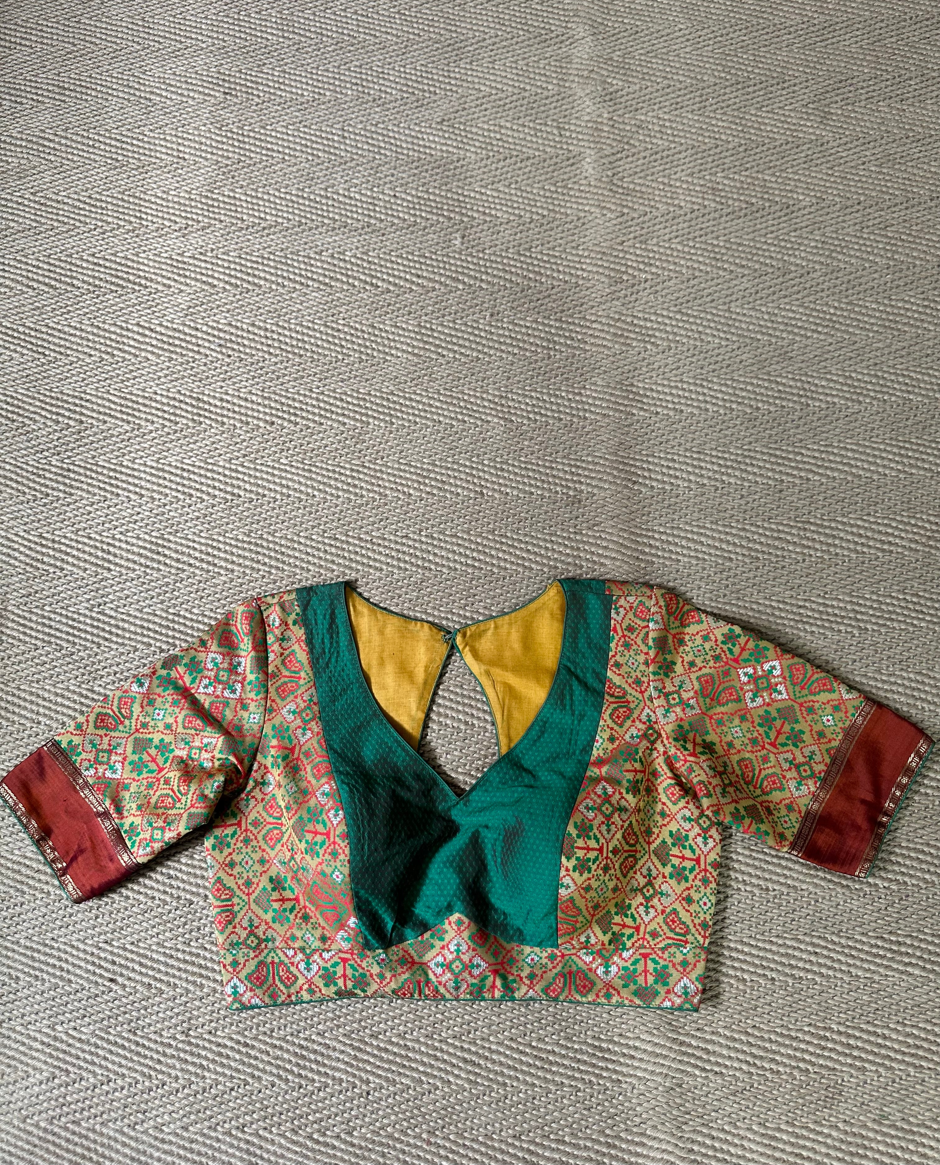 Green silk blouse