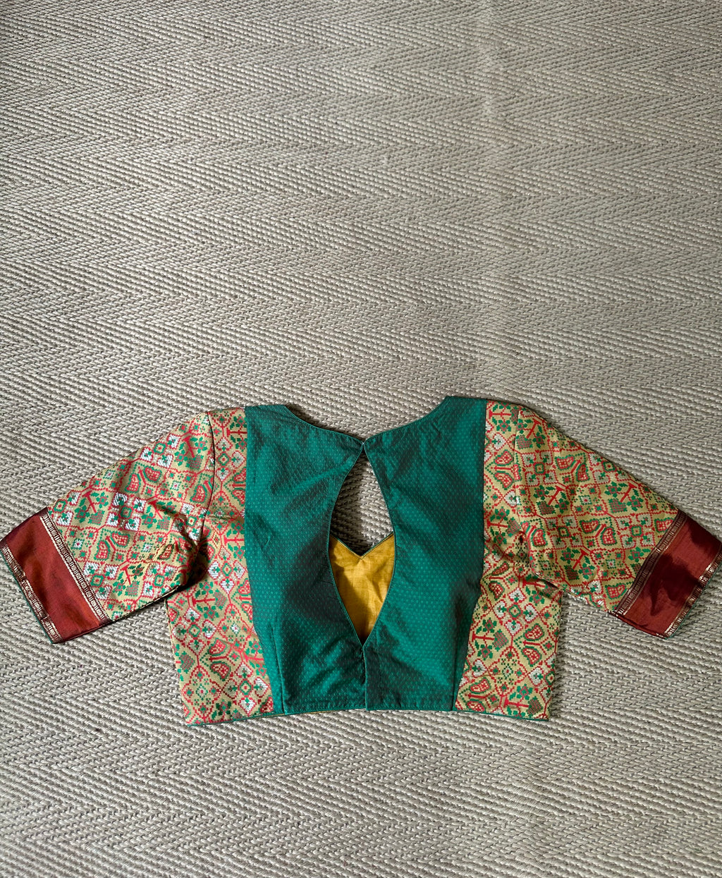 Green silk blouse