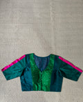 Green silk blouse