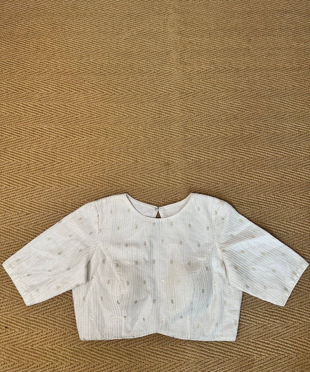Off white silk blouse with sequins