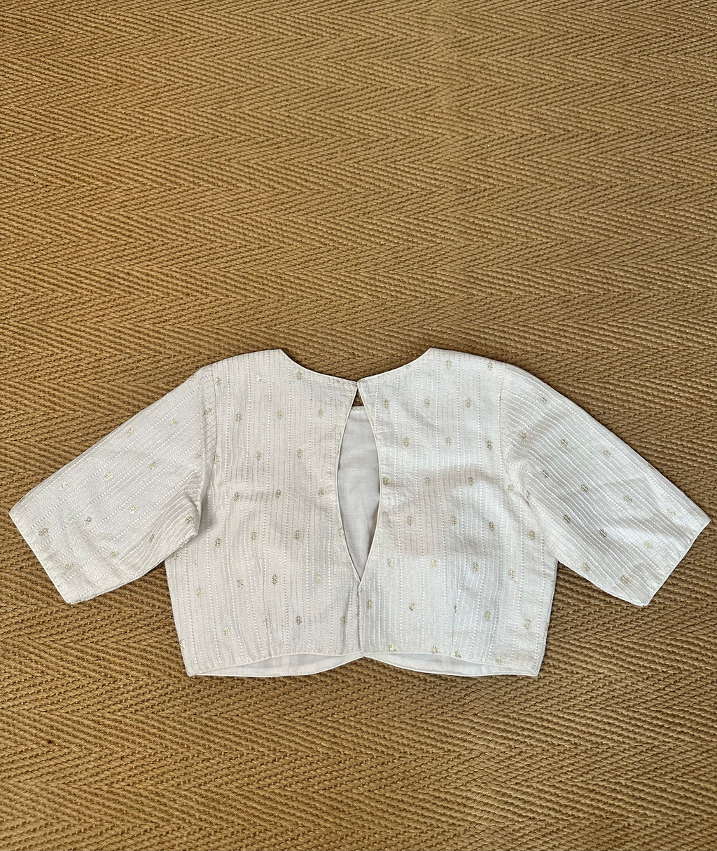 Off white silk blouse with sequins