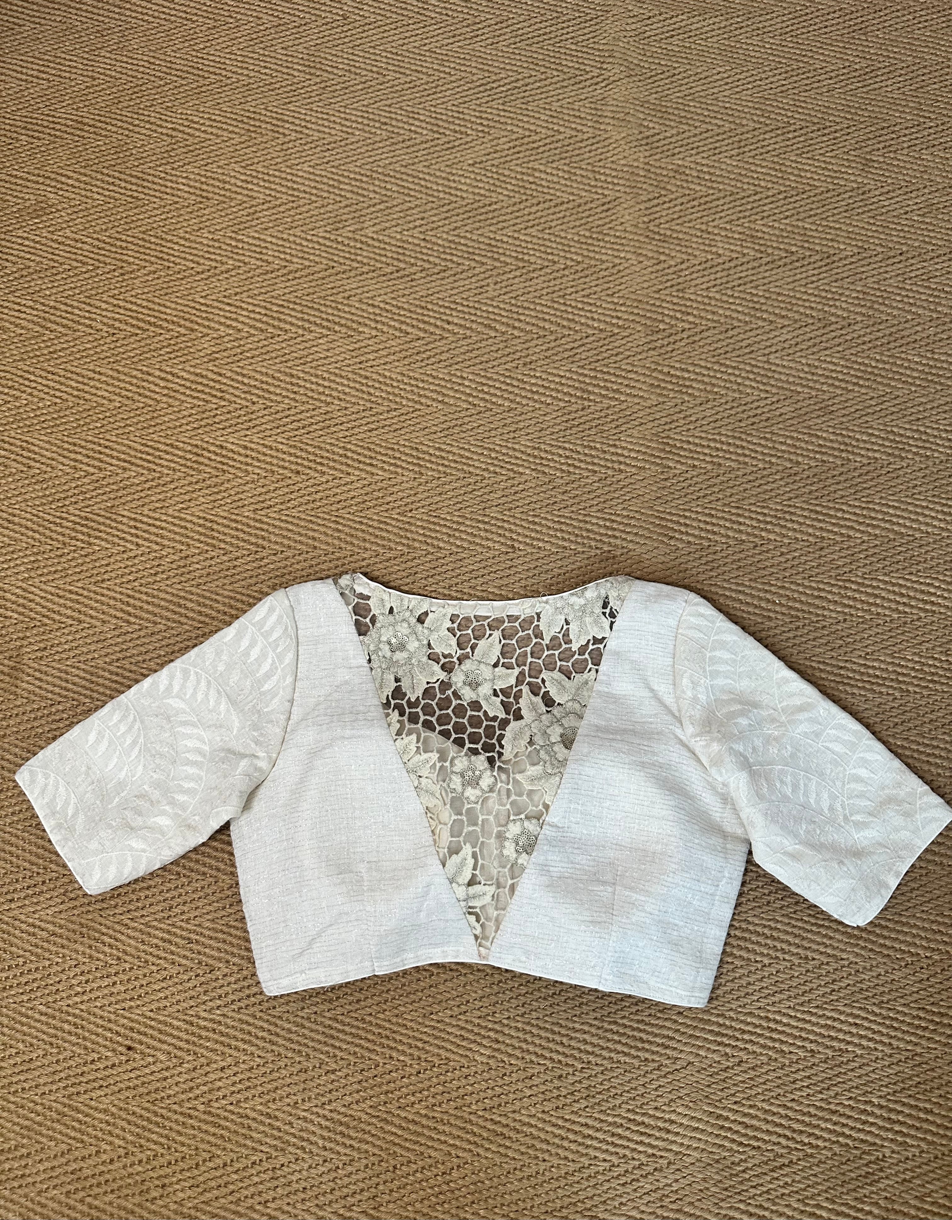 Off white linen blouse with cut work on the back