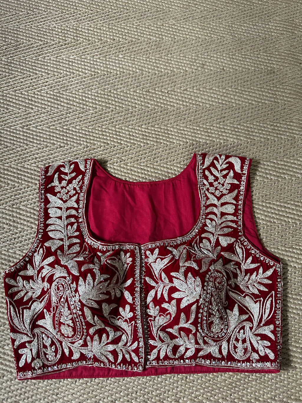 Red designer velvet sleeveless blouse