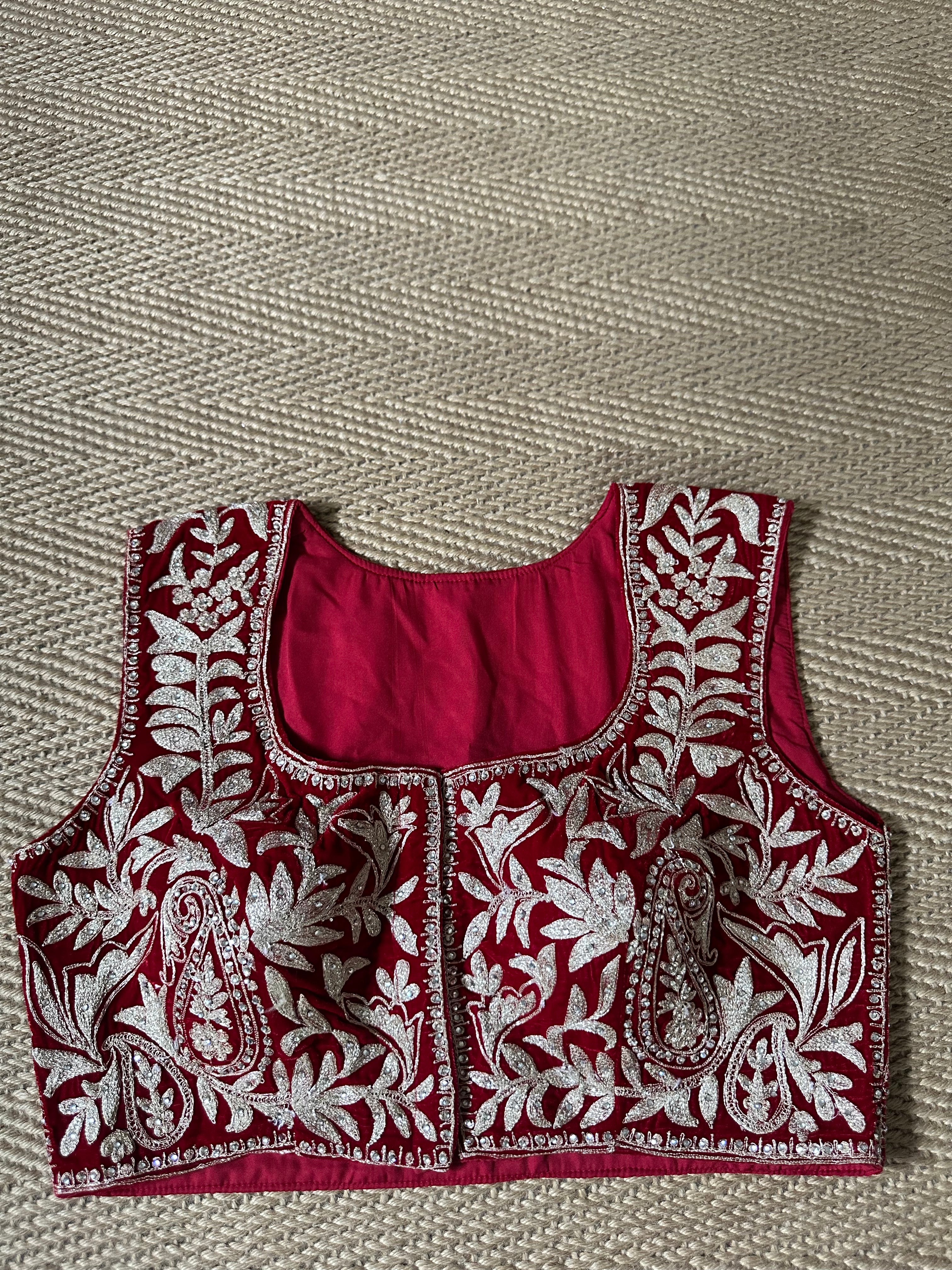 Red designer velvet sleeveless blouse