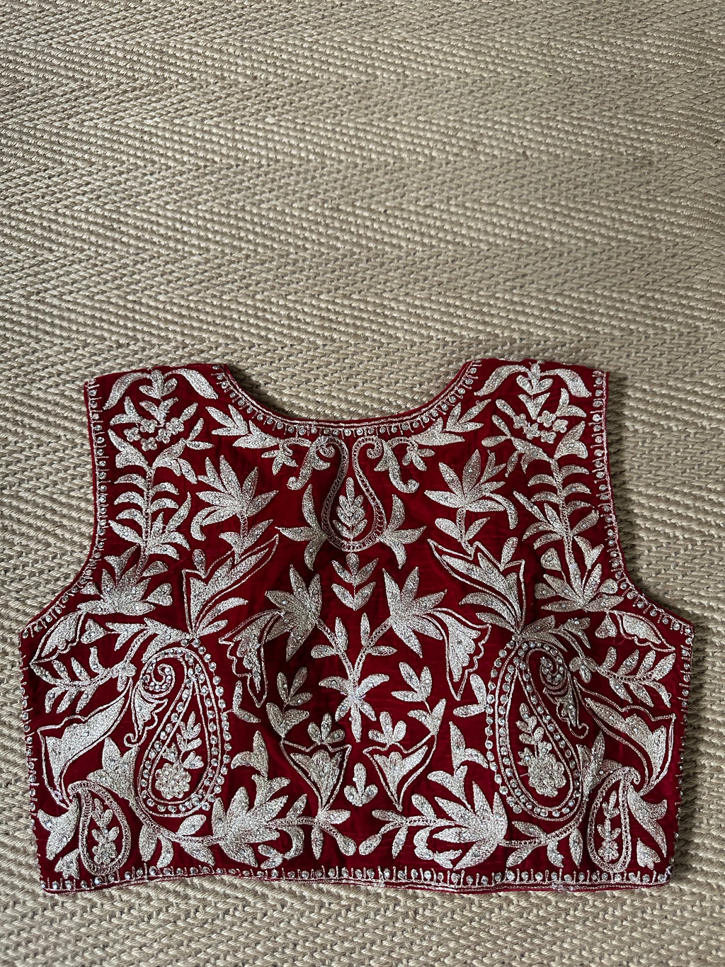 Red designer velvet sleeveless blouse