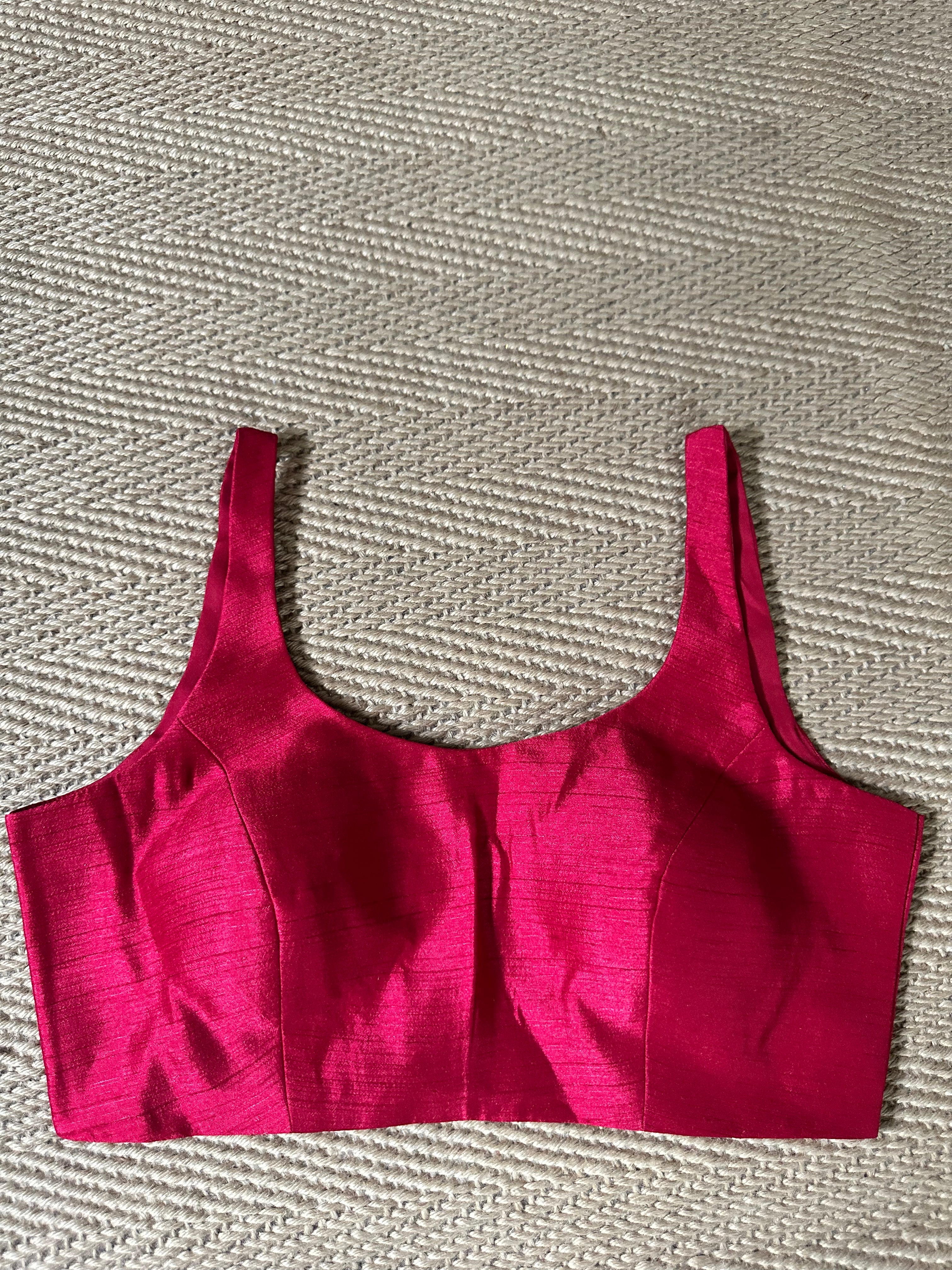 Maroon sleeveless blouse