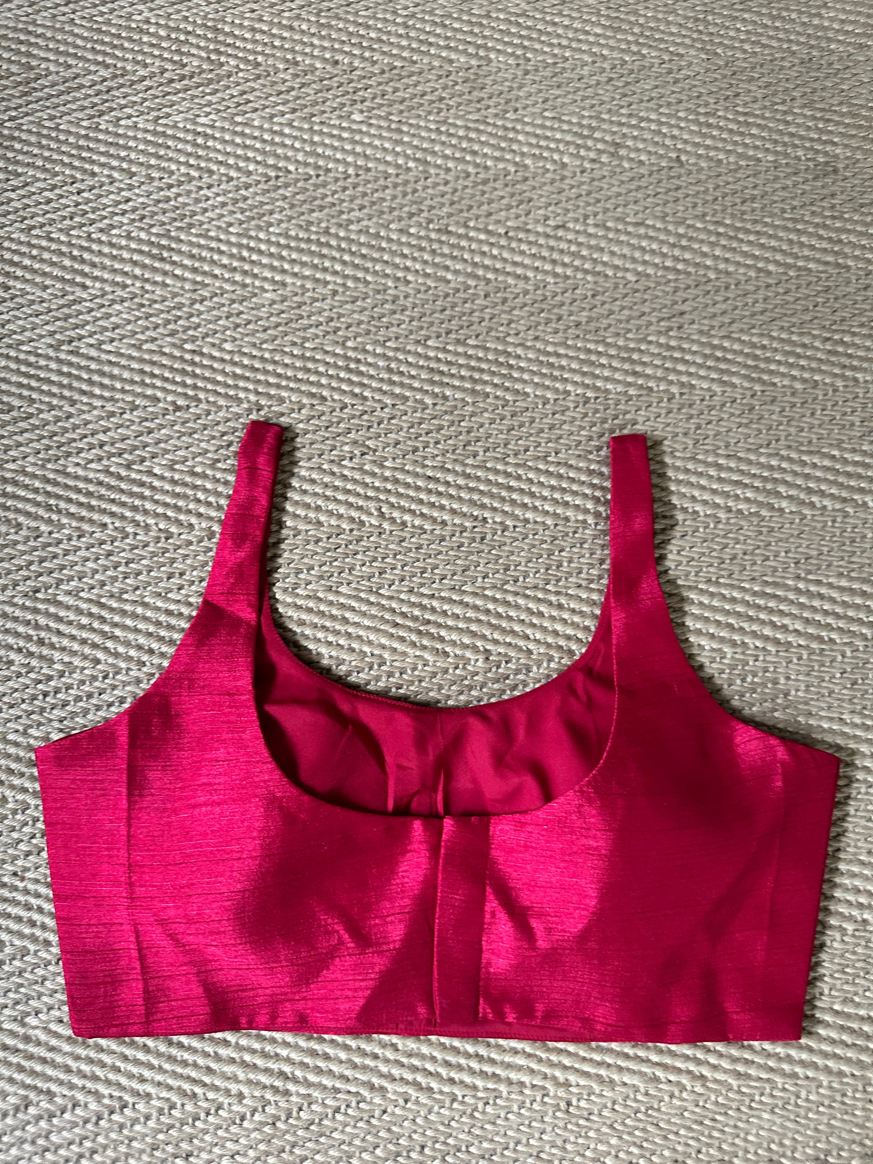 Maroon sleeveless blouse