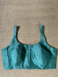 Dark sea green sleeveless blouse