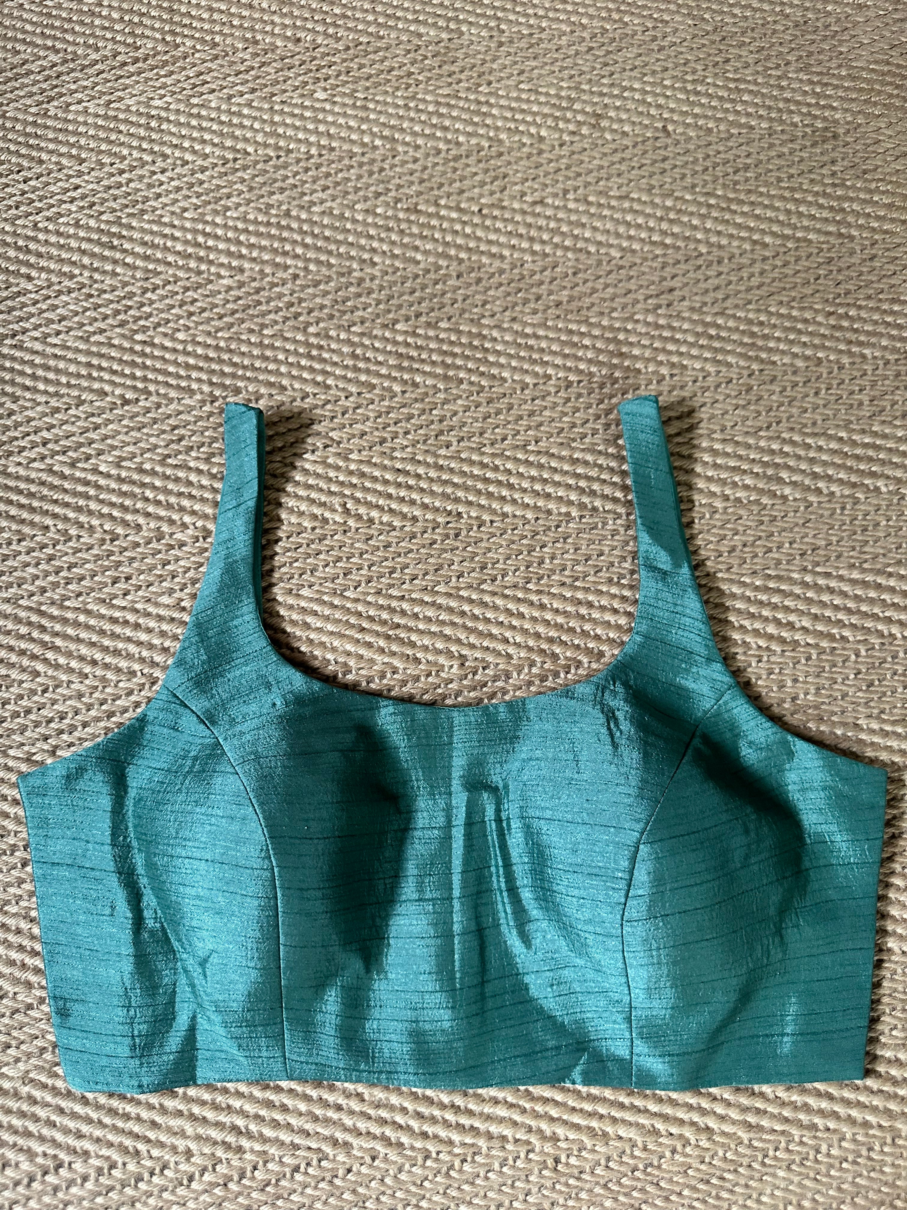 Dark sea green sleeveless blouse