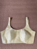 Light yellow sleeveless blouse