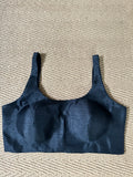 Black sleeveless blouse