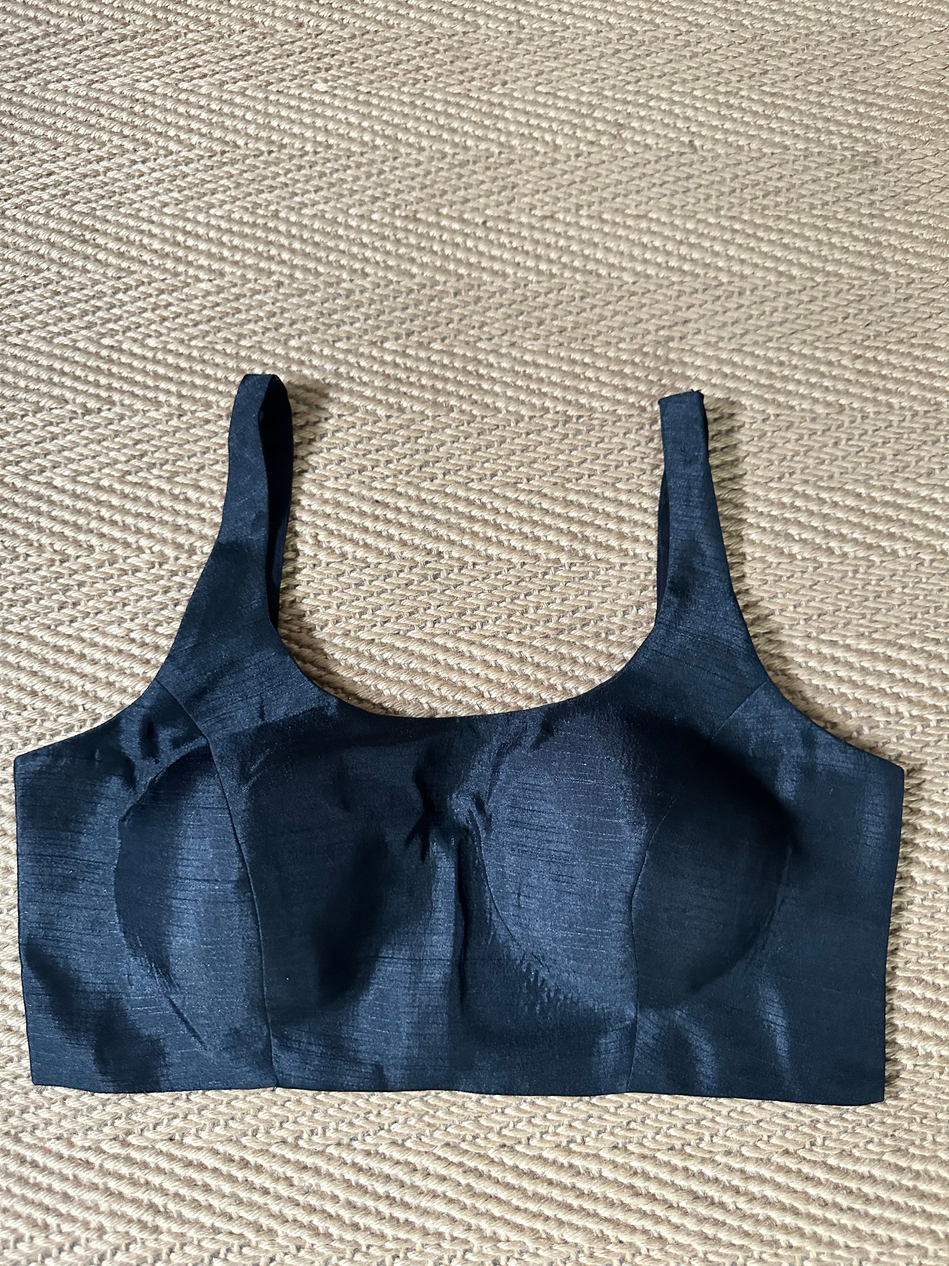 Black sleeveless blouse