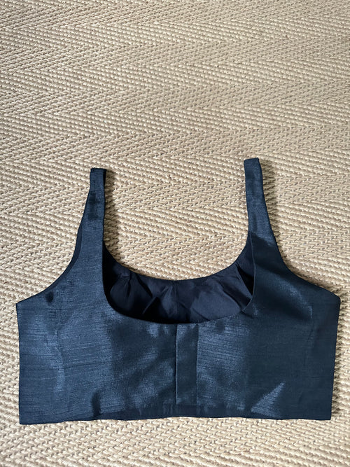 Black sleeveless blouse