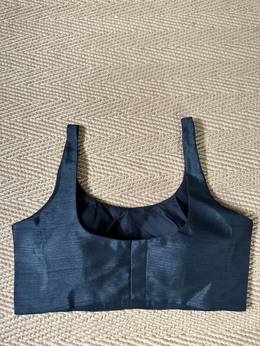Black sleeveless blouse