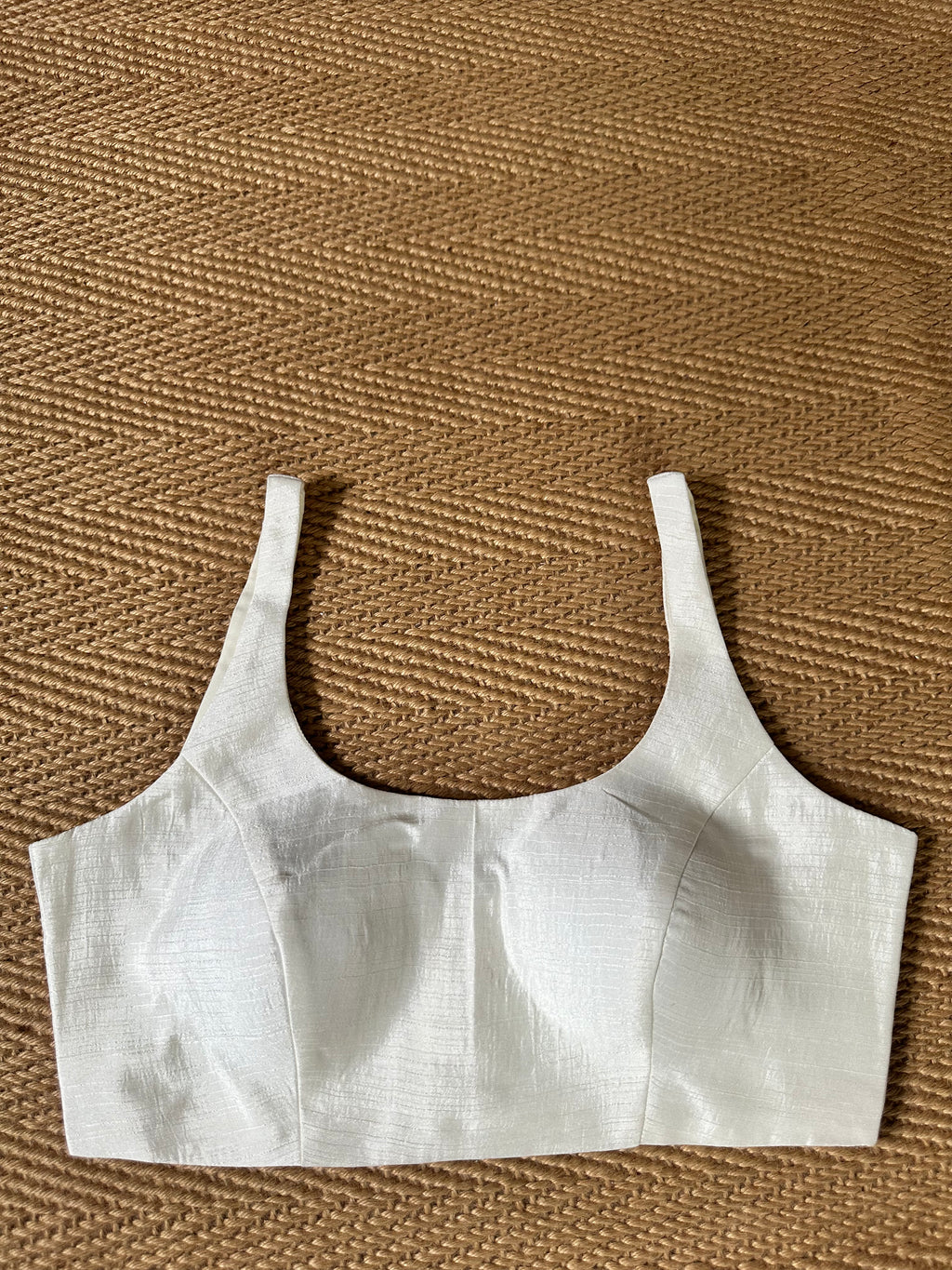 White sleeveless blouse