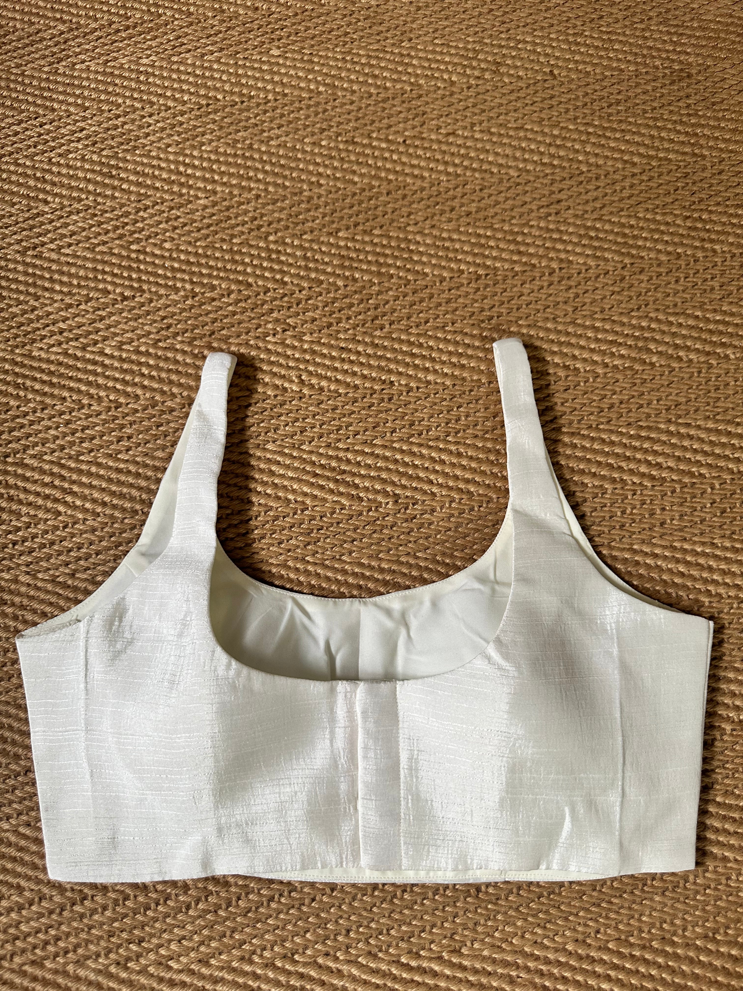 White sleeveless blouse