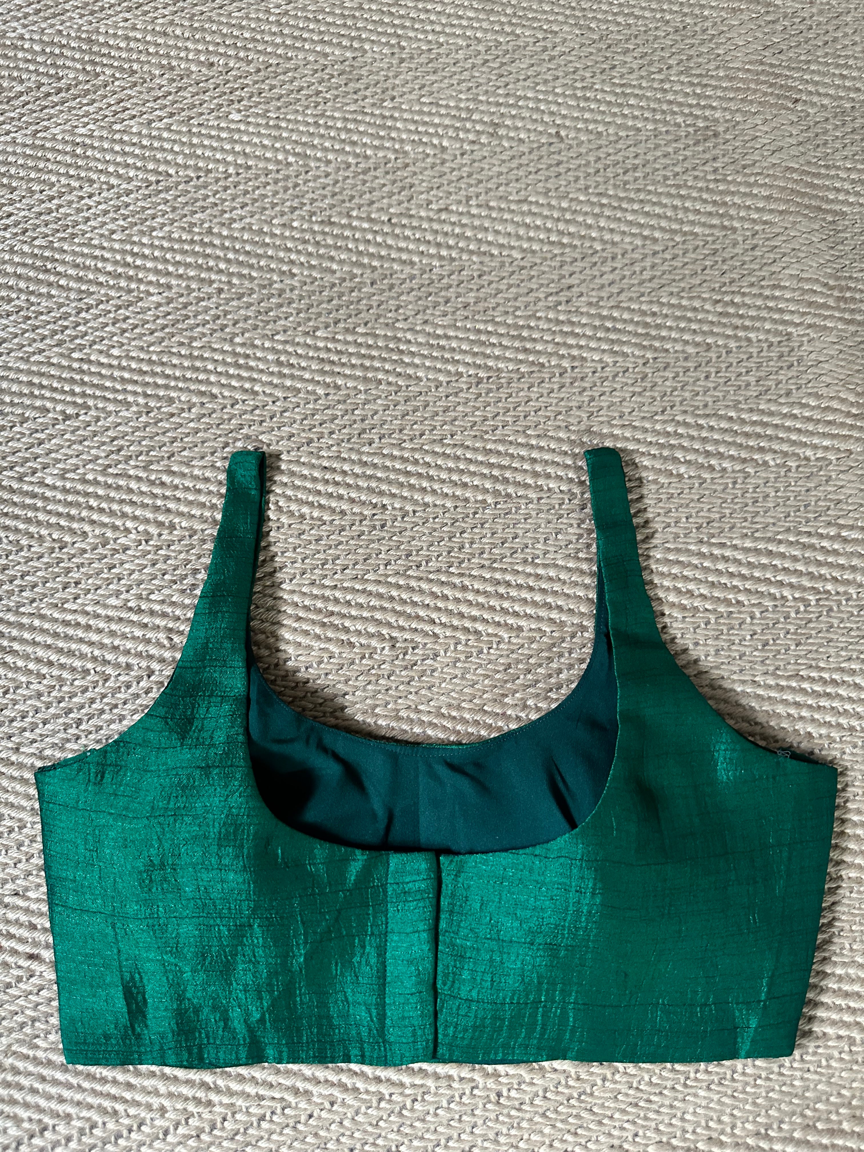 Forest green sleeveless blouse