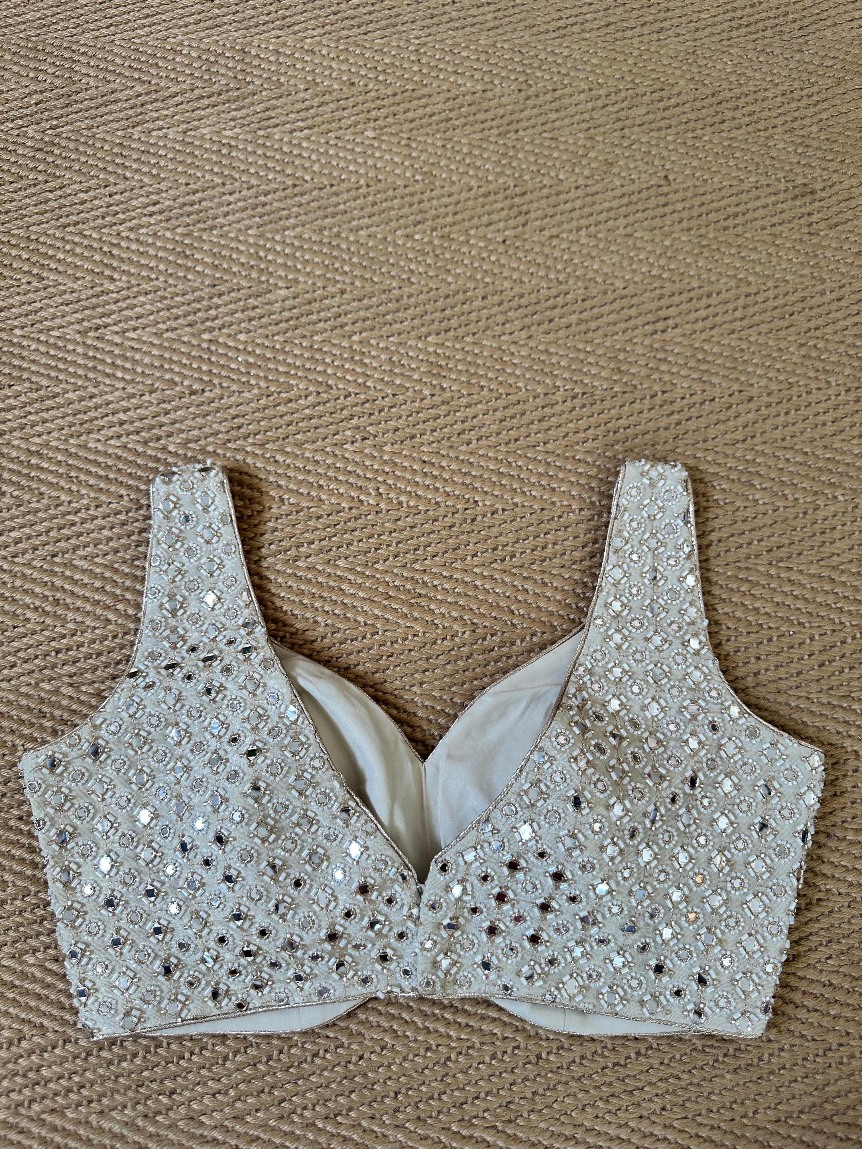 Gold designer blouse with rbead work
