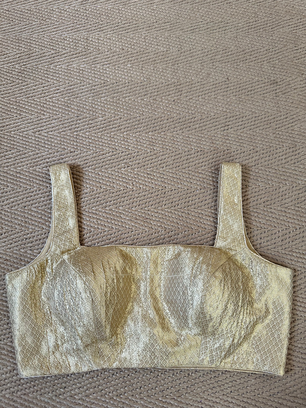 Gold brocade sleeveless blouse