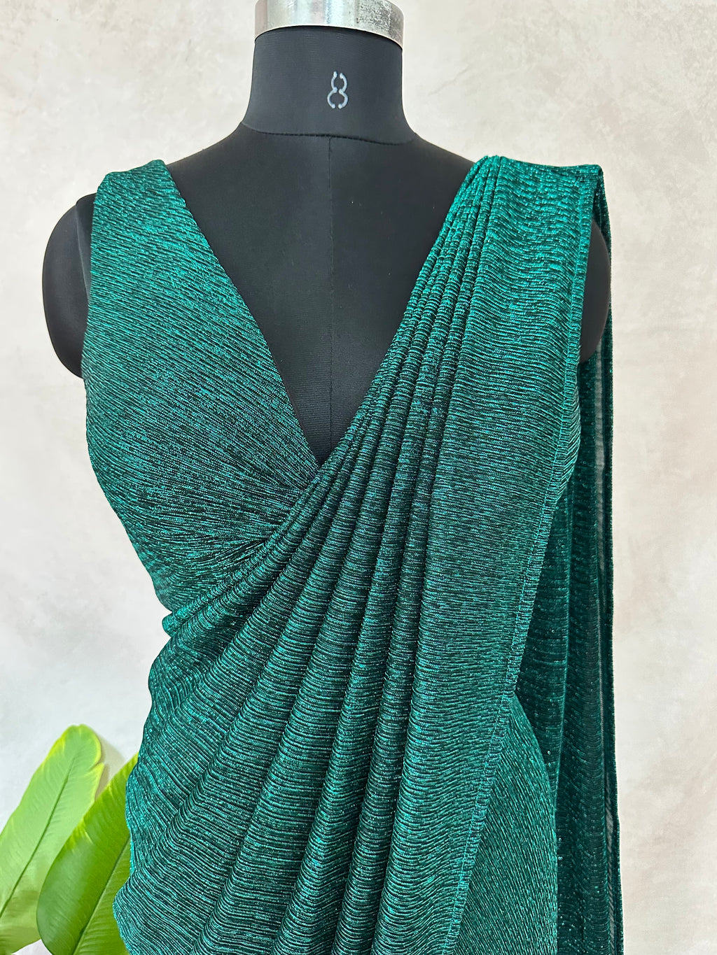 Ready made pre pleated green metalic saree with designer blouse