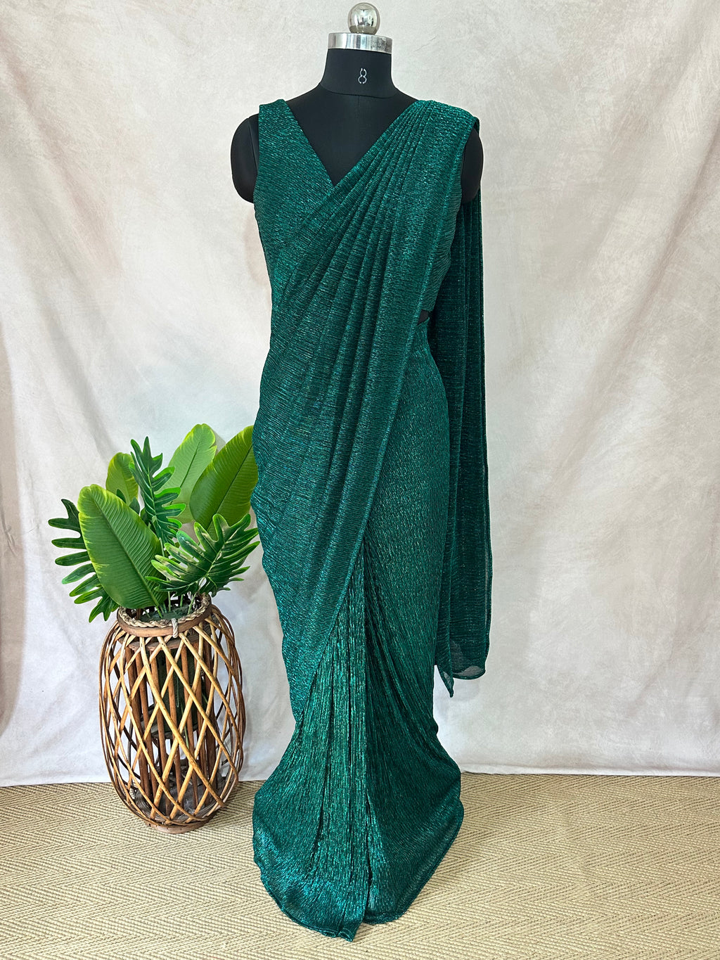 Ready made pre pleated green metalic saree with designer blouse