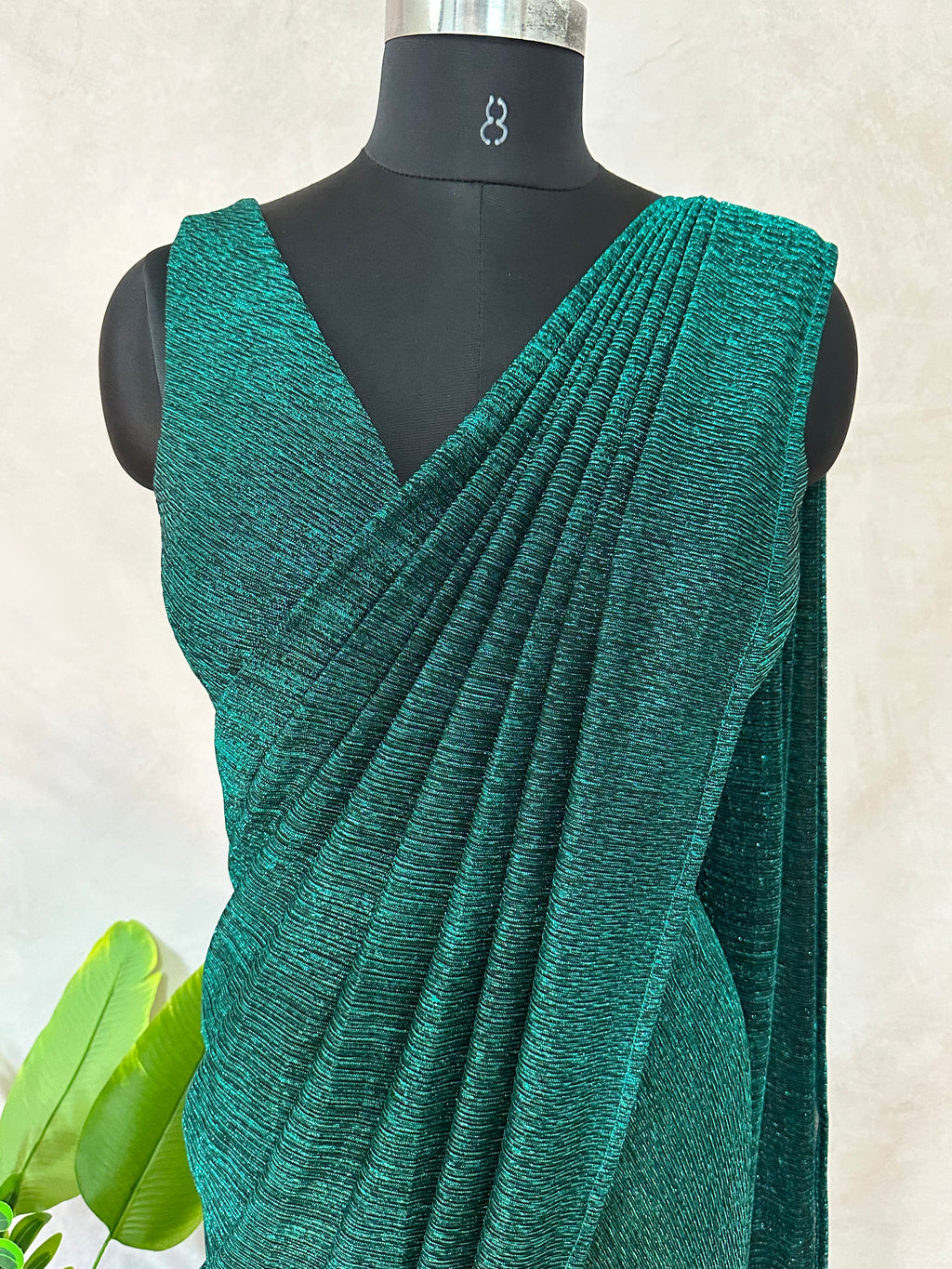 Ready made pre pleated green metalic saree with designer blouse