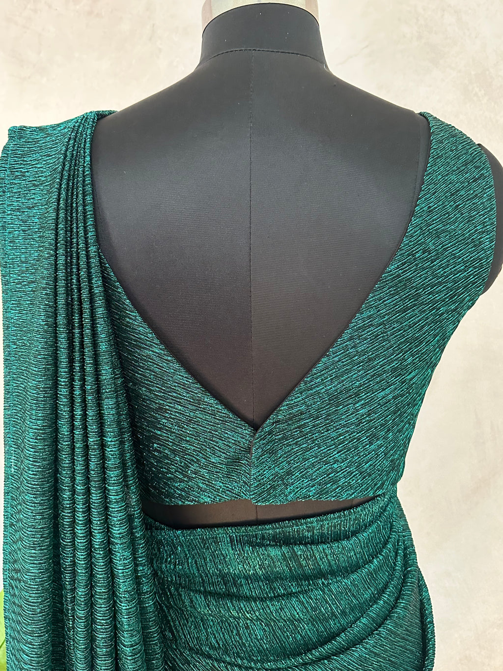 Ready made pre pleated green metalic saree with designer blouse