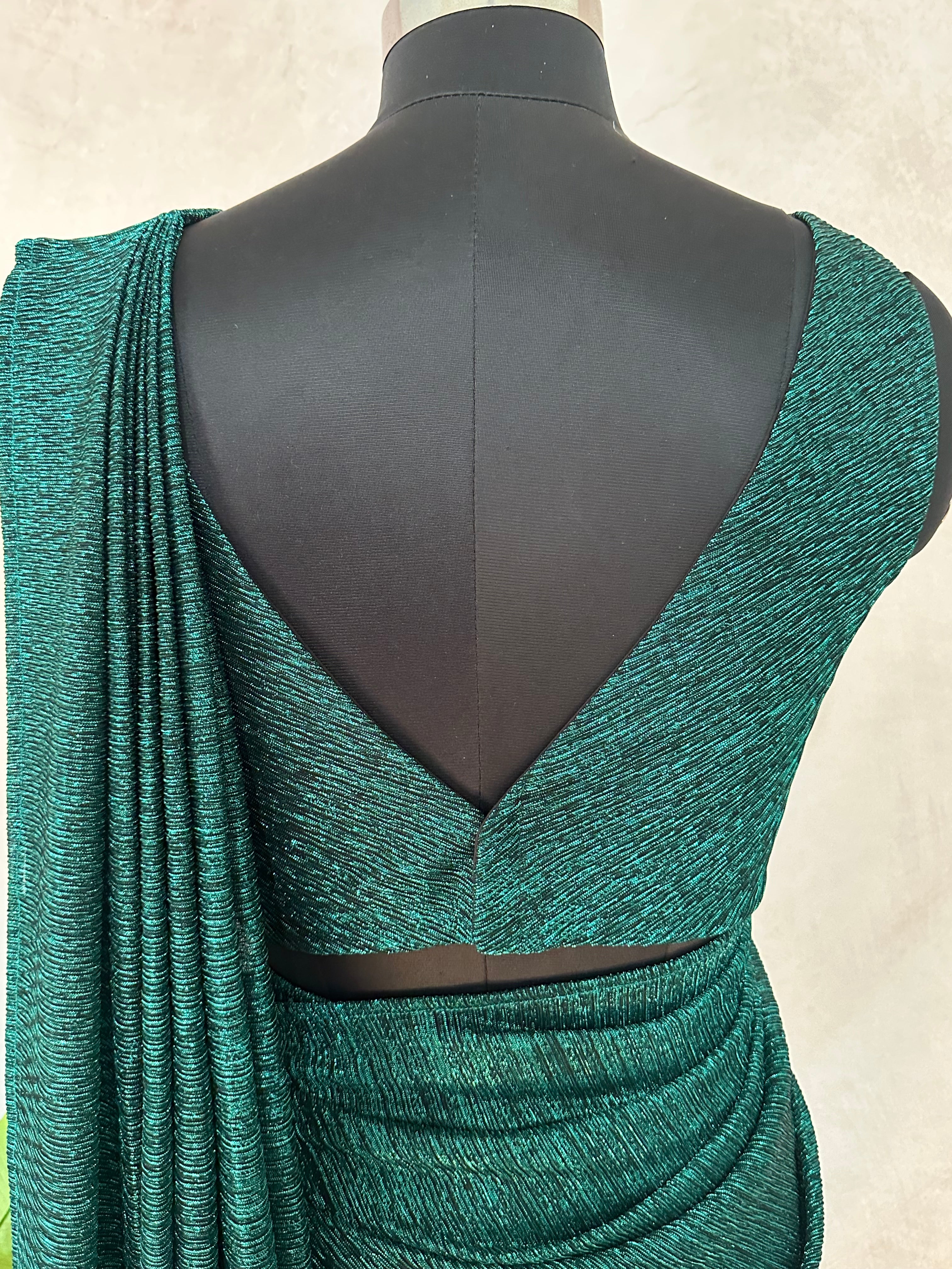 Ready made pre pleated green metalic saree with designer blouse