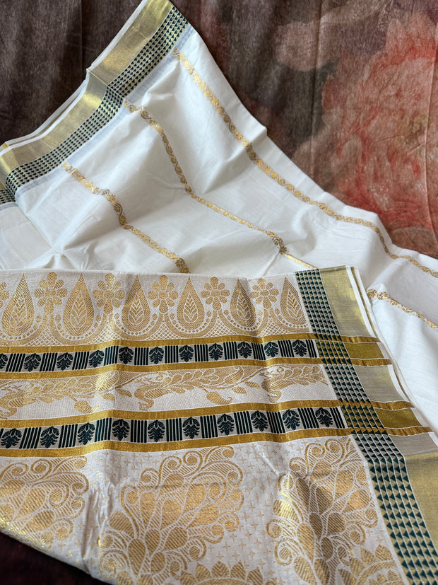 Set saree with green and gold weaved border