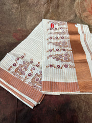 Set saree with copper border and maroon print