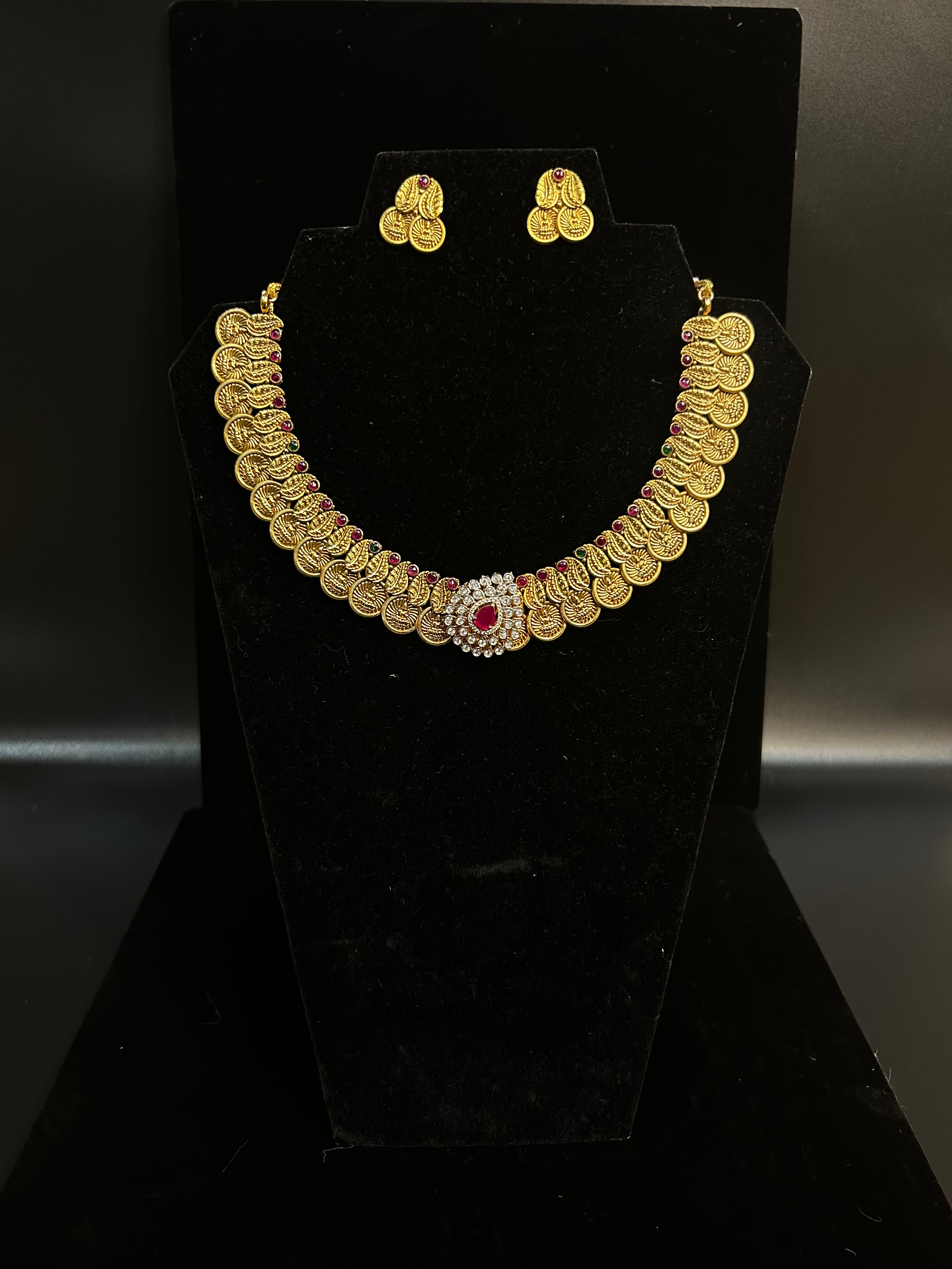 Coin necklace with detachable pendent and stud