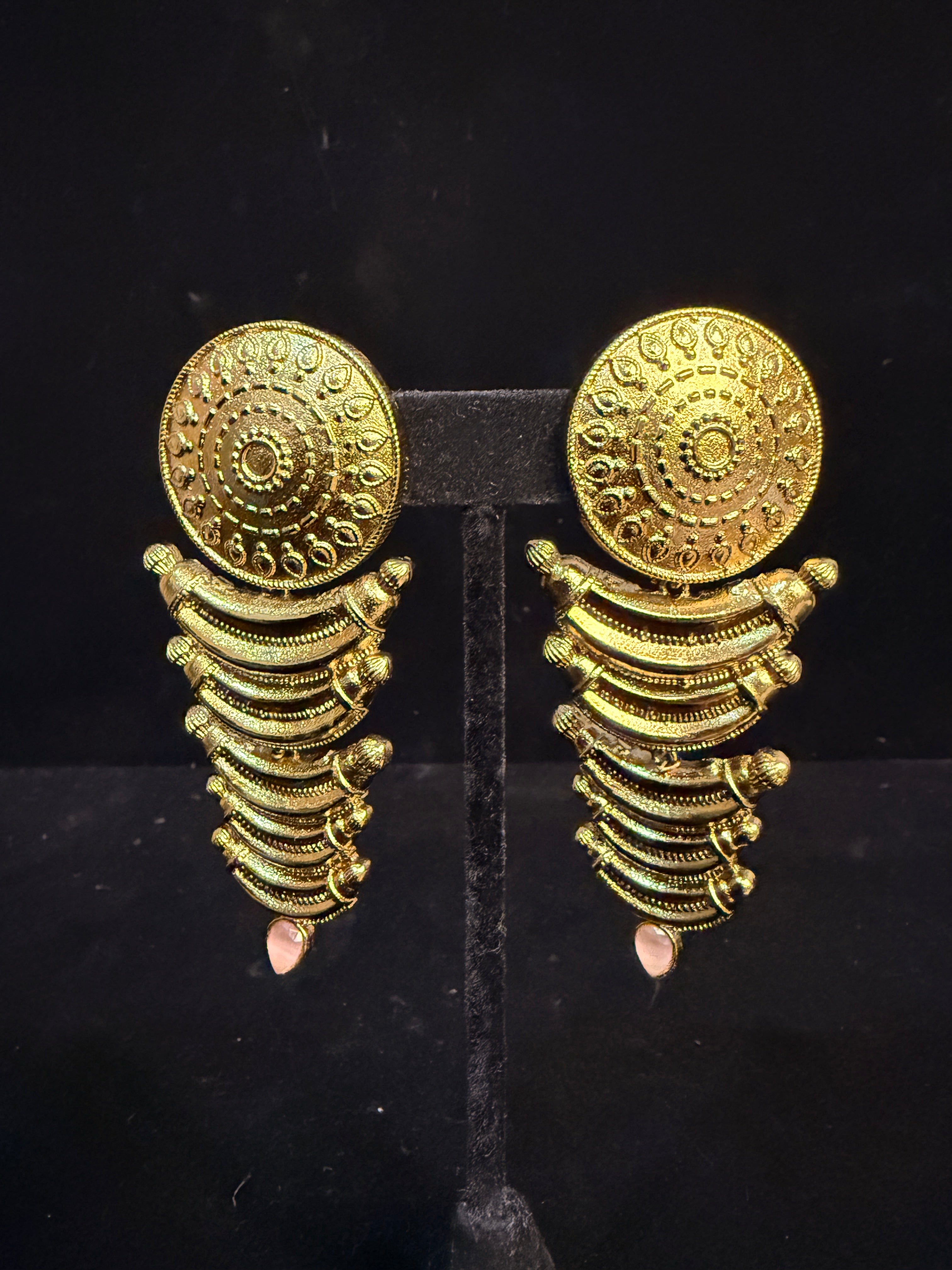 Designer earring with light pink stone