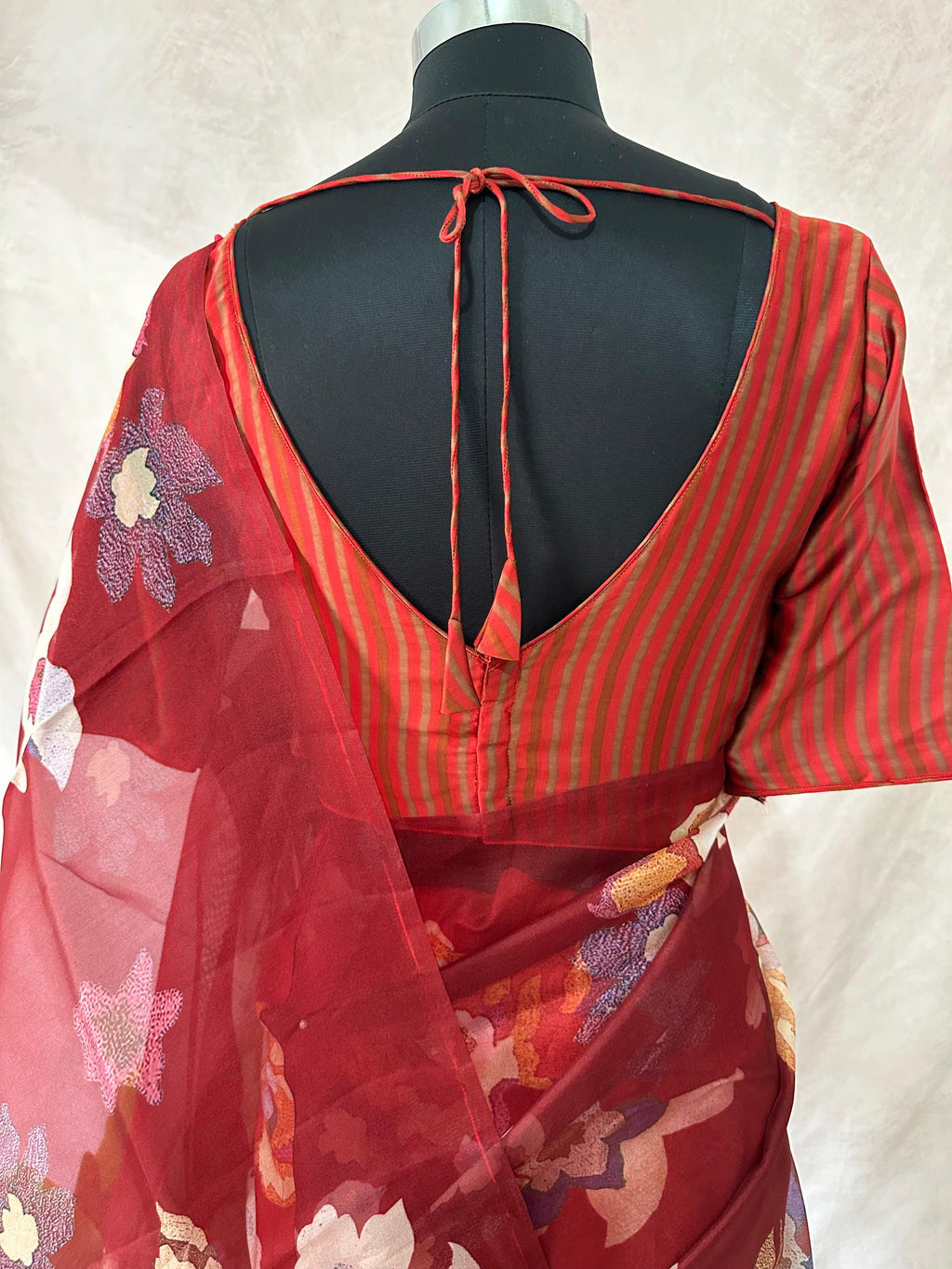 Dark Red printed organza silk saree with stitched blouse