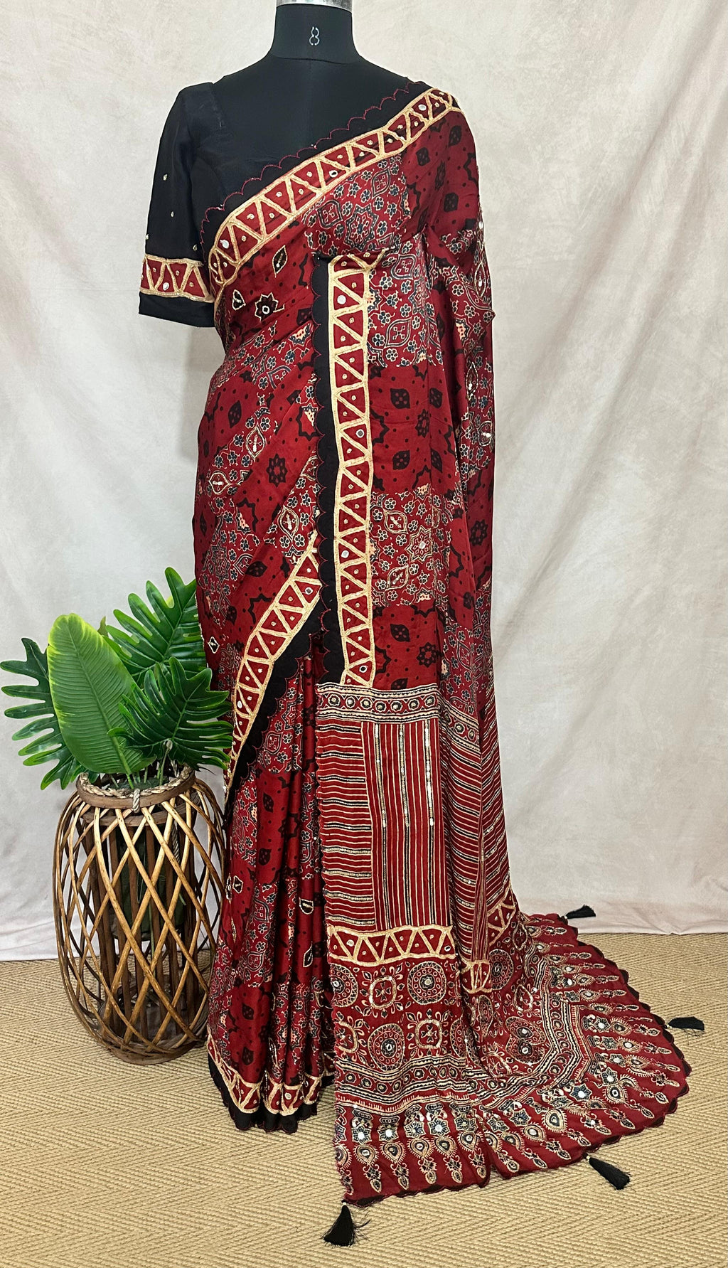 Designer Ajrakh modal silk saree with bead and mirroer handwork, stitched blouse