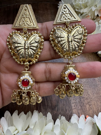 Long earring with red stone