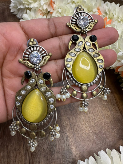 Dual tone earring with yellow stone