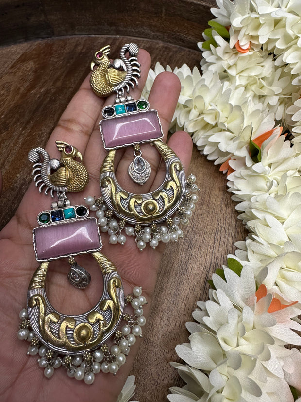 Long earring with pink stone