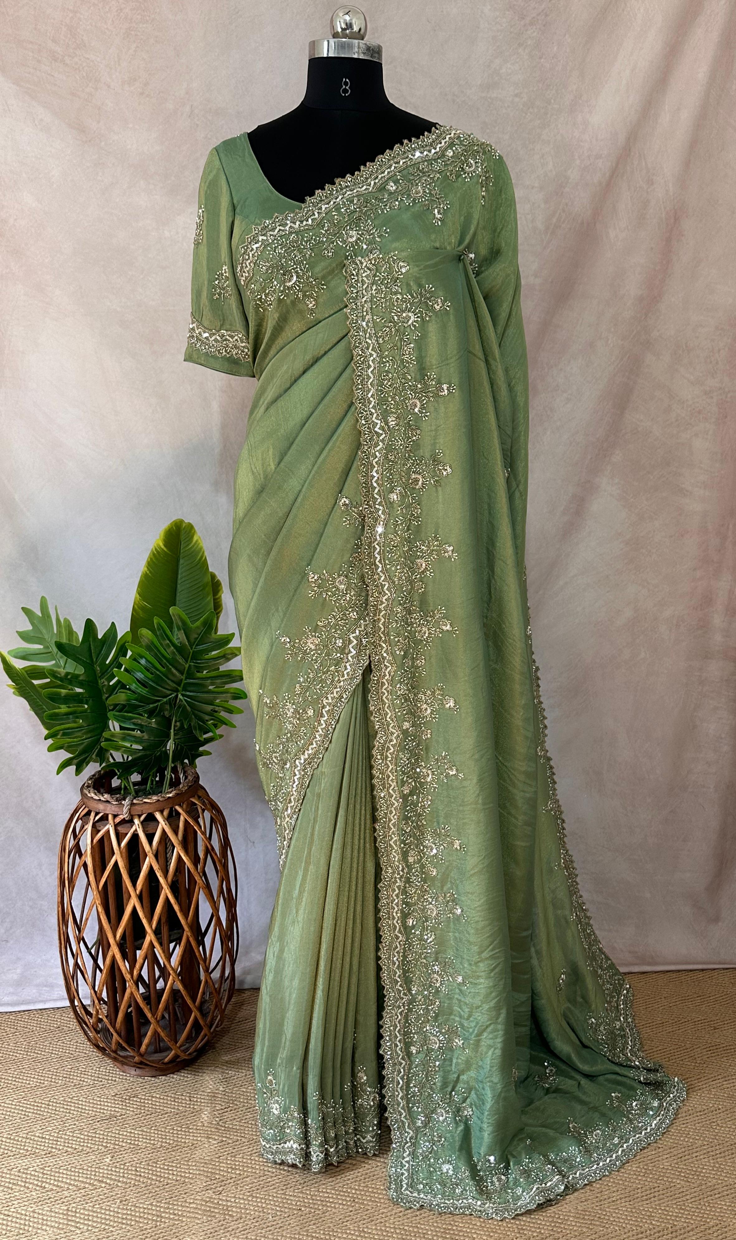 Green tissue designer saree with stitched blouse and under skirt