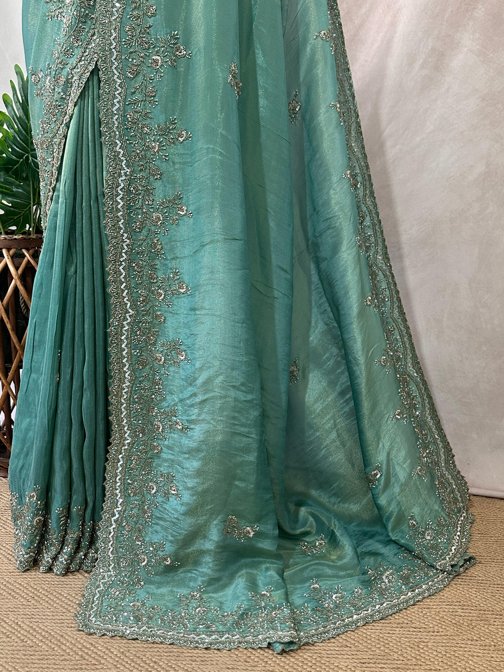 Green tissue designer saree with stitched blouse and under skirt