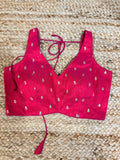 Pink sleeveless blouse
