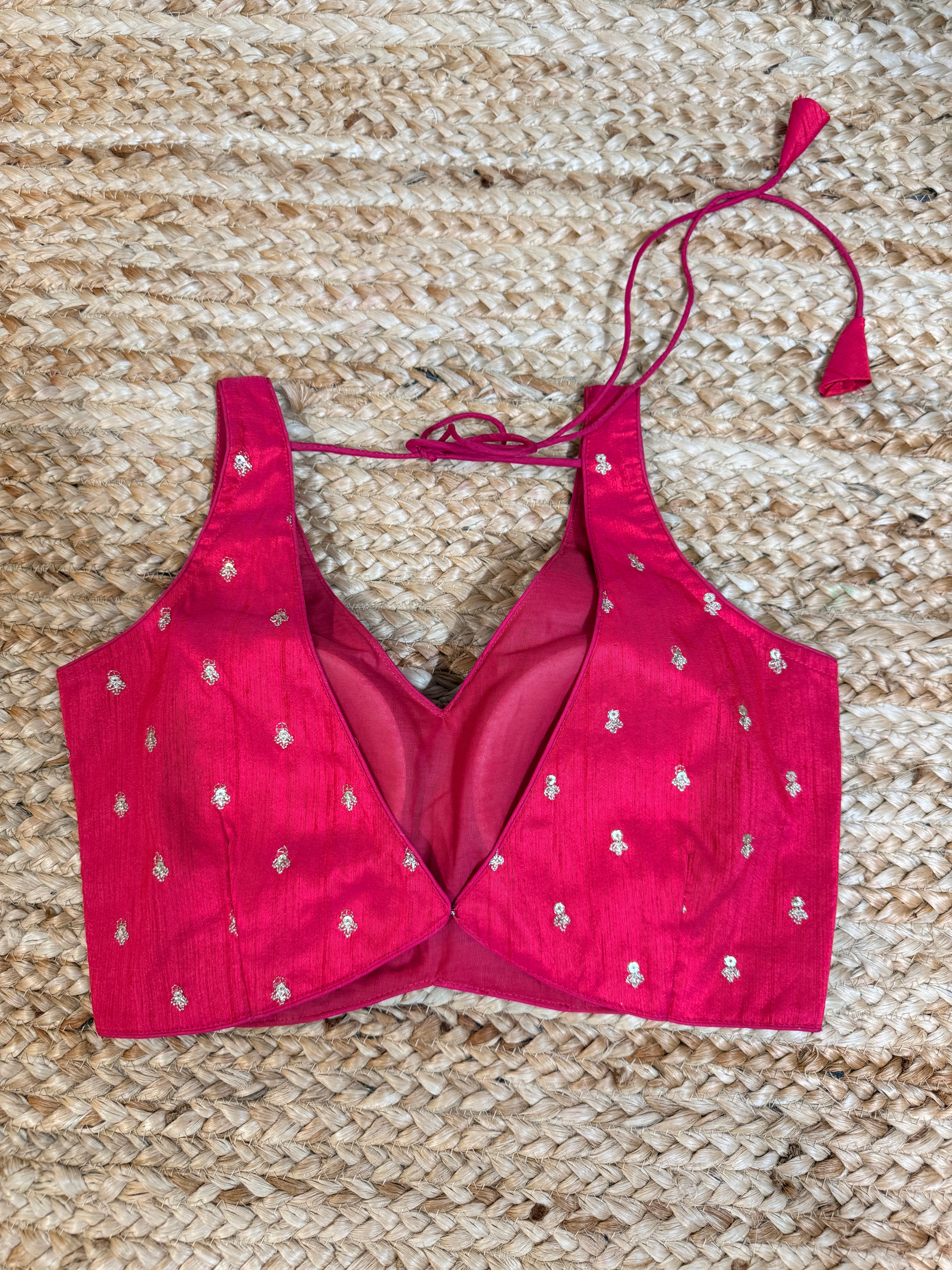 Pink sleeveless blouse