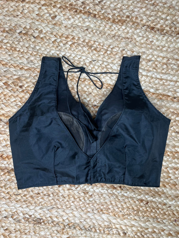 Black sleeveless blouse