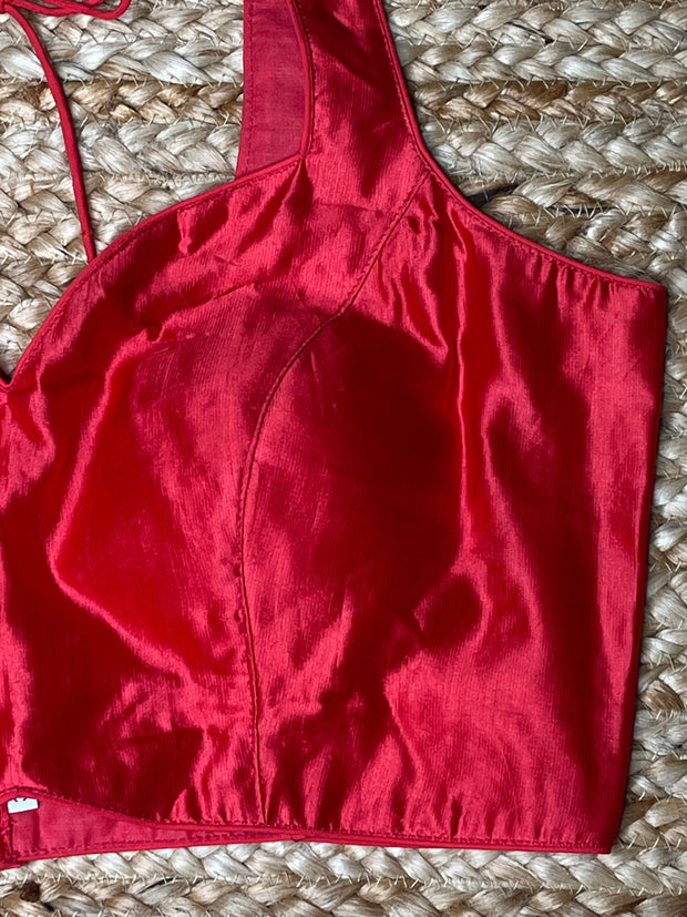 Coral color silk sleeveless blouse