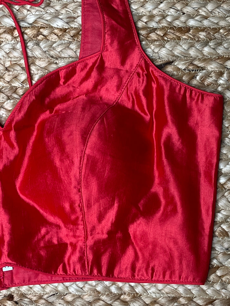 Coral color silk sleeveless blouse