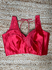 Coral color silk sleeveless blouse