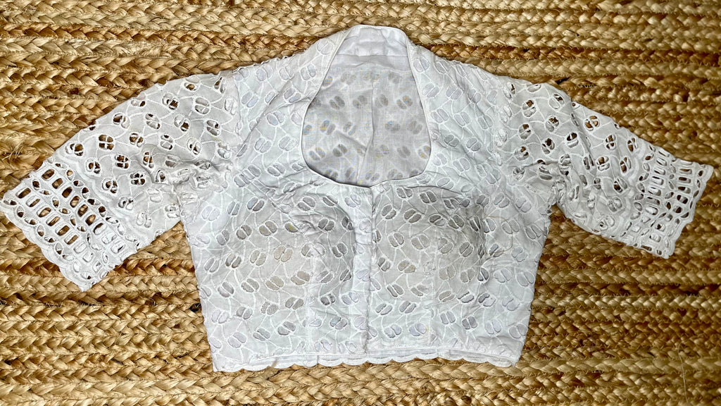 White cutwork blouse