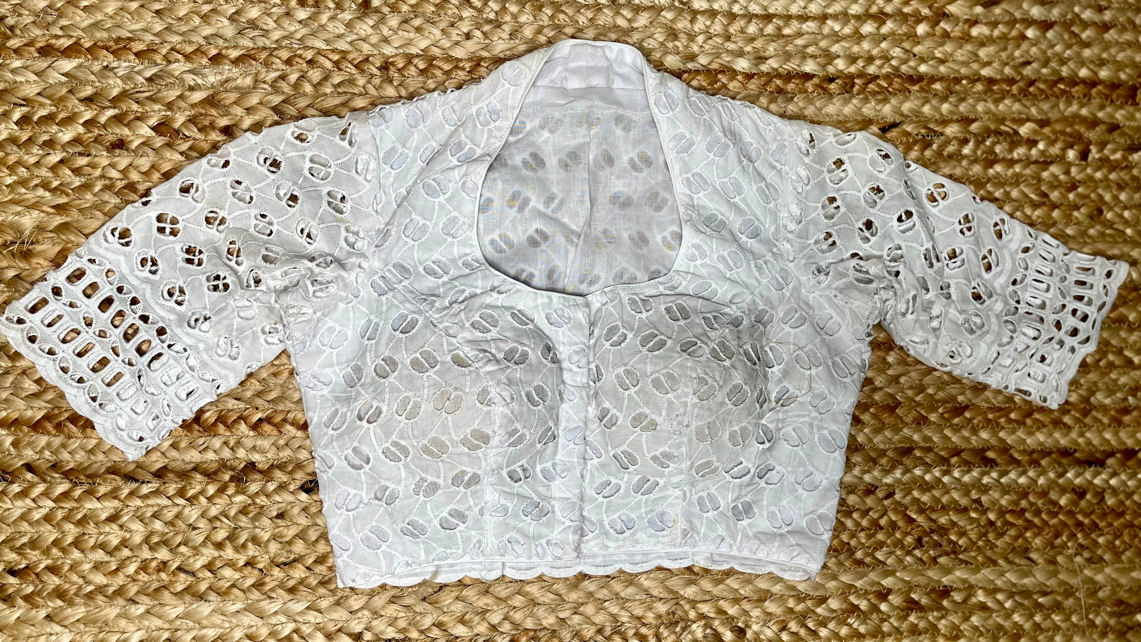 White cutwork blouse
