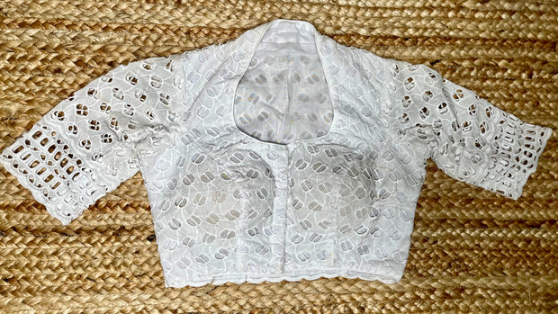 White cutwork blouse